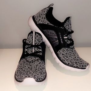 Black and grey running shoes